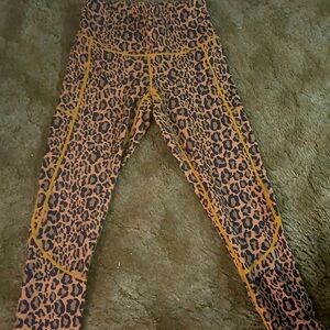 Feed Me Fight Me leopard leggings.
